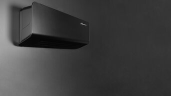 Wandmontierter Fancoil Galileo in schwarz | © bösch heizung.klima.lüftung