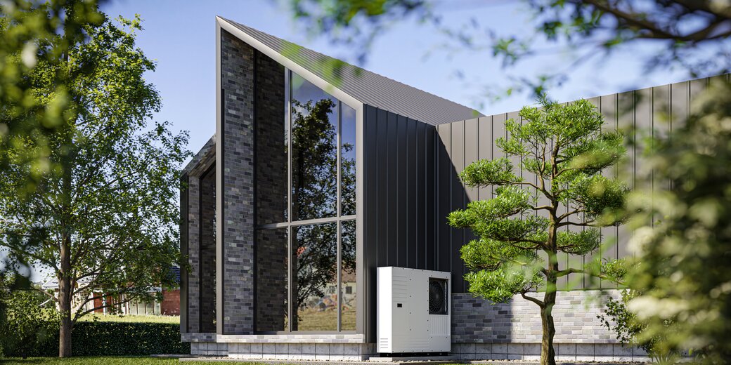 Modernes Gebäude mit Wärmepumpe im Grünen – Symbol für klimafreundliches Heizen und Energiewende im Gebäudesektor